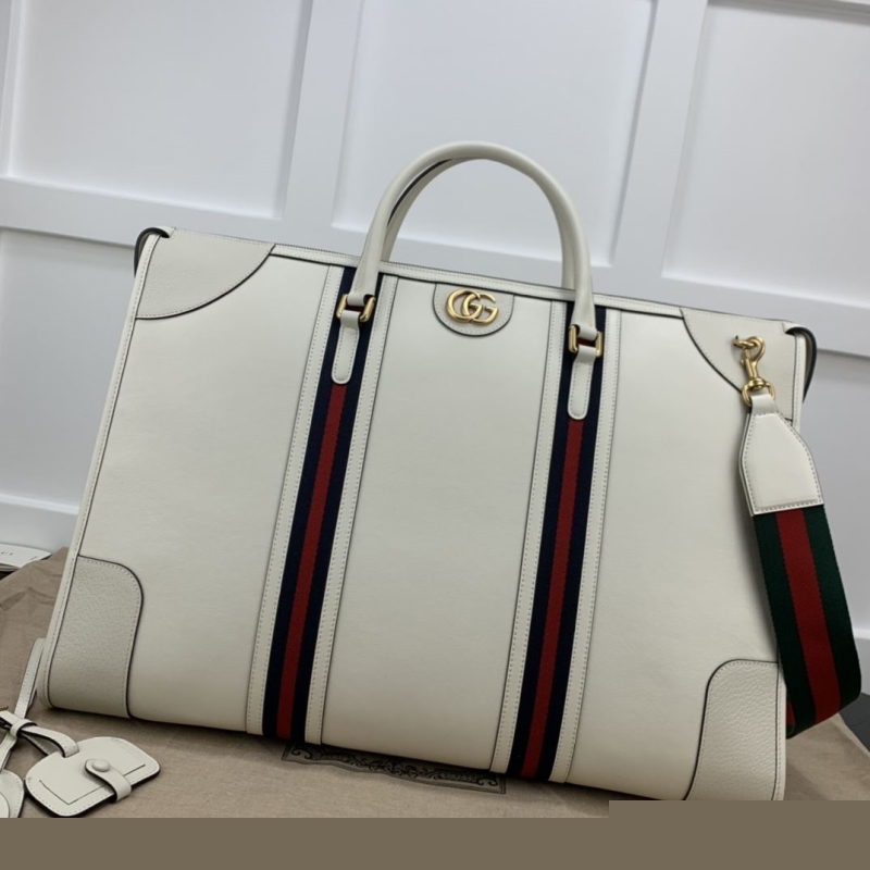 G*u*i shopping bags